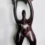 African Brown Uplifting Wooden Carving Statue - Image 3