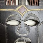 Black African Face Mask with Brown Animal Carving - Image 3
