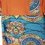 (Size 7) Orange Unisex Kids Shirt with Turquoise Ankara Print Detail - Image 3