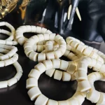 ￼ 2 Traditional Unisex African Nigerian Artificial Beige Coral Bead Bracelet
