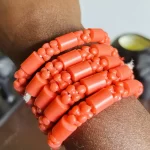 ￼ 2 Traditional Unisex African Nigerian Artificial Orange Coral Bead Bracelet